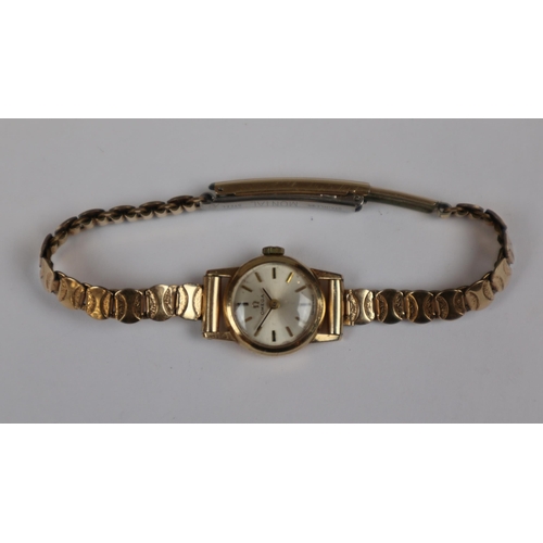 103 - Ladies Omega 17 jewel watch with a 9ct gold case & a rolled gold strap