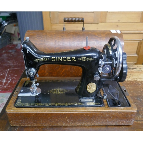 322 - Singer sewing machine in excellent condition with original instructions & fittings
