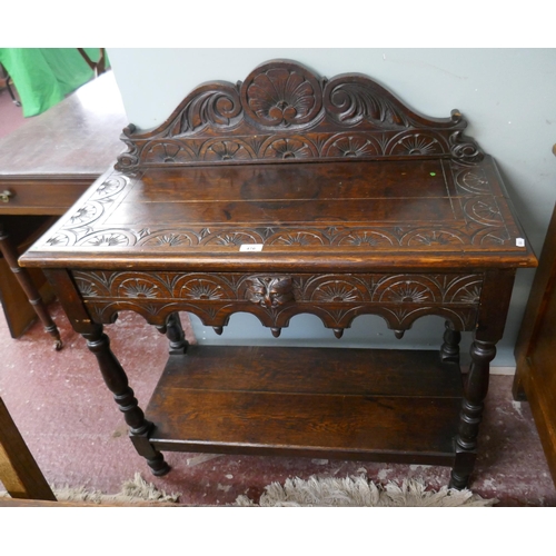 476 - Carved side table - Approx size: W: 92cm D: 40cm H: 98cm