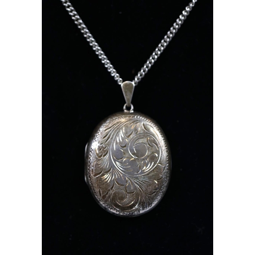 70 - Large silver locket on chain