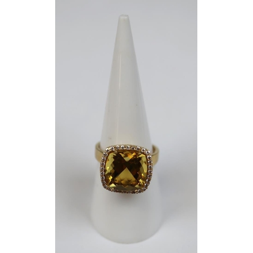 71 - Fine 18ct gold citrine and diamond set ring - Size N