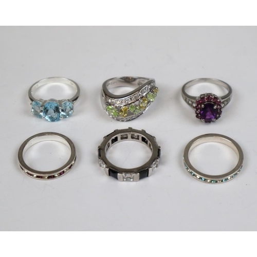 75 - 6 silver stone set rings