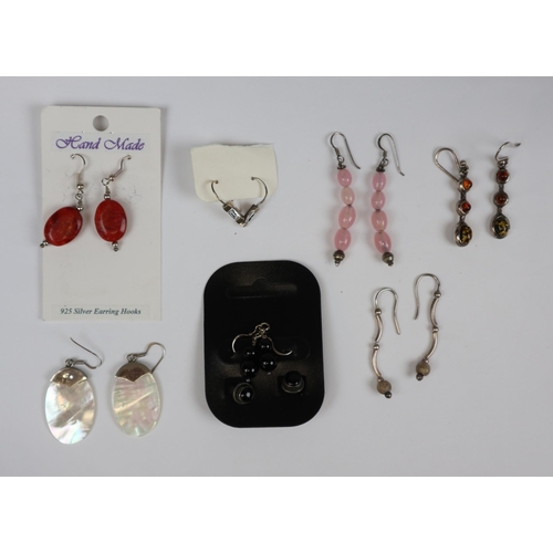 92 - 8 pairs of silver earrings