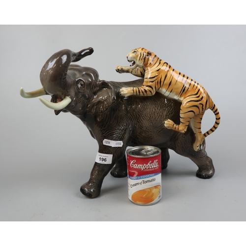 196 - Large Beswick elephant & tiger - Approx height 30cm A/F  (tusks have been reattached it does dis... 