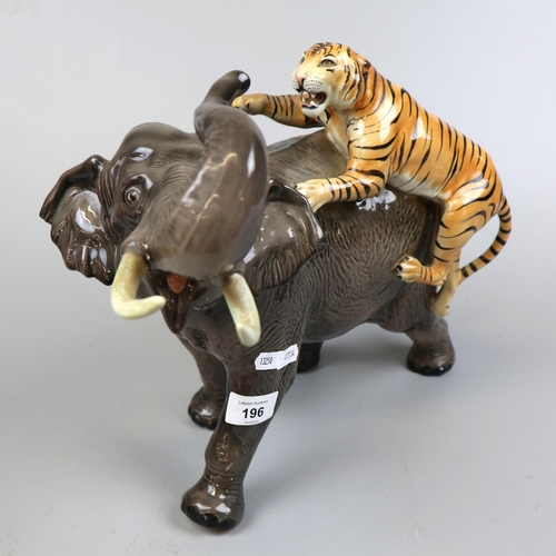 196 - Large Beswick elephant & tiger - Approx height 30cm A/F  (tusks have been reattached it does dis... 