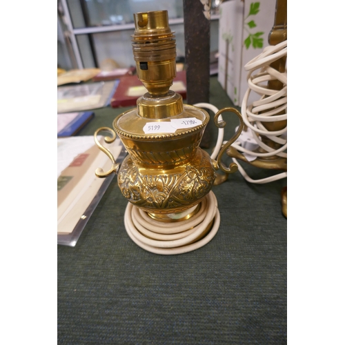 255 - Pair of brass antique lamps and another