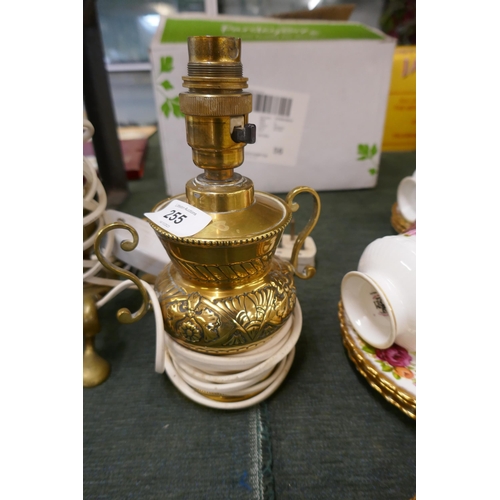 255 - Pair of brass antique lamps and another