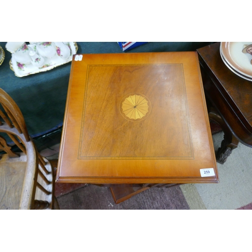 259 - Yew wood revolving bookcase