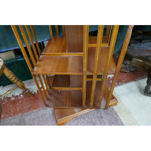 259 - Yew wood revolving bookcase