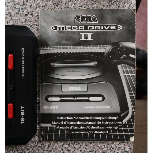 384 - Sega Mega Drive II complete in working order with games and manual