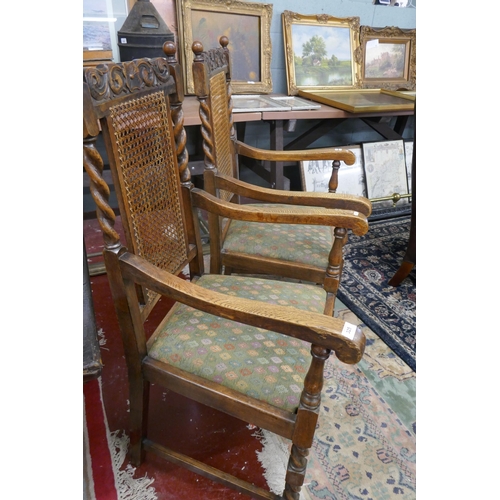 325 - Pair of bergere and barley-twist oak armchairs
