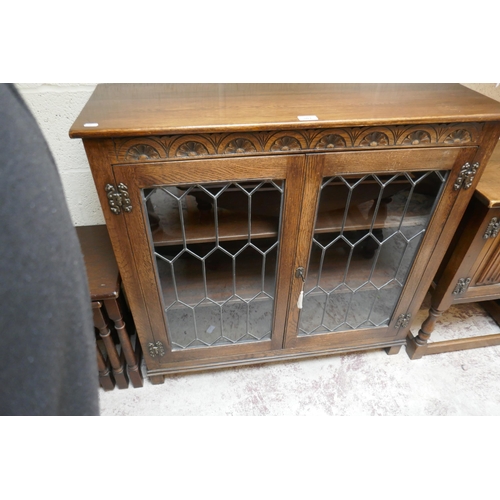 503 - 2 nests of tables, pot cupboard and glazed oak bookcase