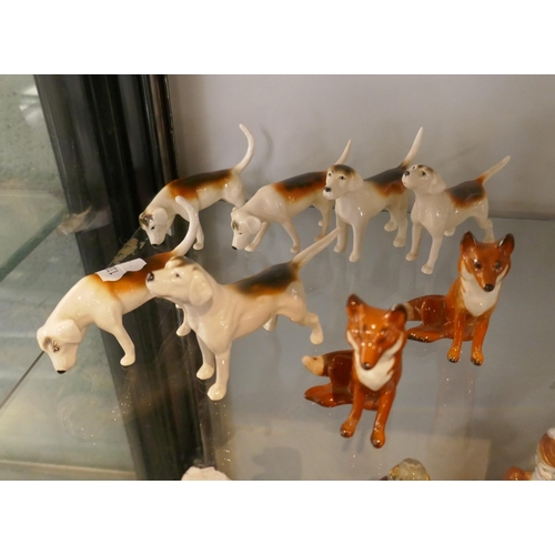 143 - Collection of 6 Beswick hounds with 2 foxes