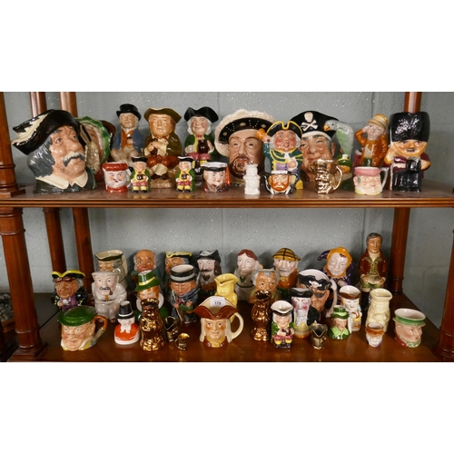 179 - Large collection of Toby jugs and character jugs to include Royal Doulton