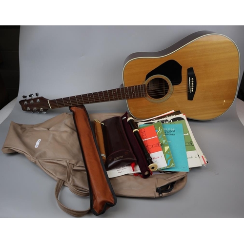 225 - Guitar - Nabish together with recorders and musical books