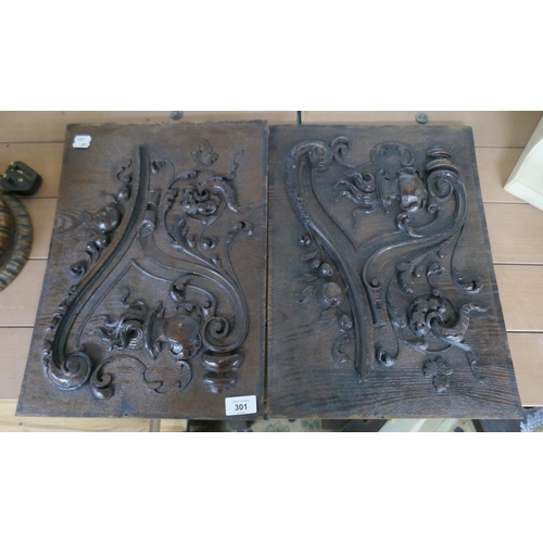 301 - Pair of carved wooden panels