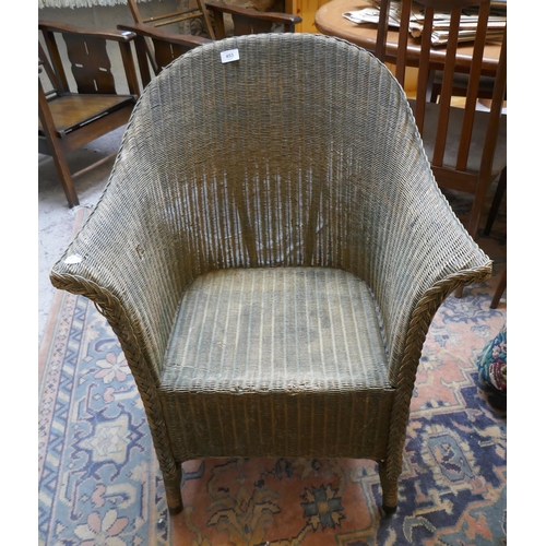 453 - Lloyde Loom arm chair
