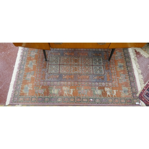 483 - Red patterned rug - Approx size: 120cm x 186cm