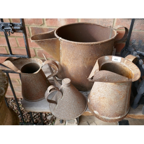 493 - Assorted metal measuring jugs