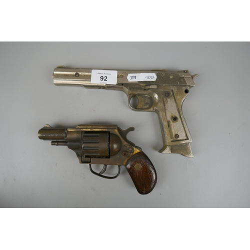 92 - 1970s Agent 007 James Bond toy gun together with 1980s Magnum toy gun