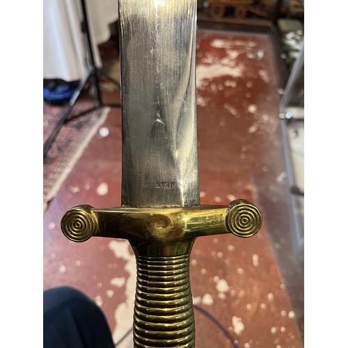 137 - Pair of swords with brass handles