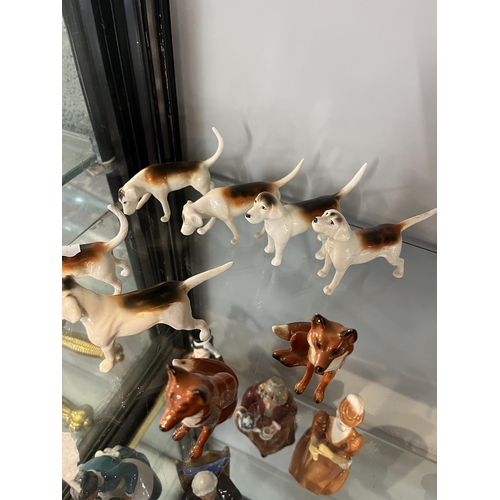 143 - Collection of 6 Beswick hounds with 2 foxes