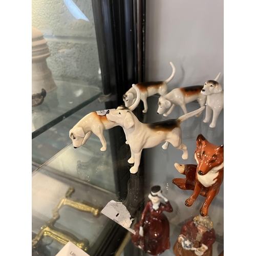 143 - Collection of 6 Beswick hounds with 2 foxes