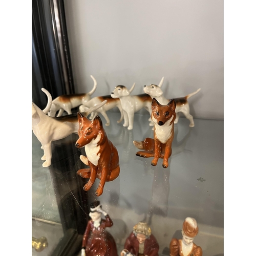 143 - Collection of 6 Beswick hounds with 2 foxes