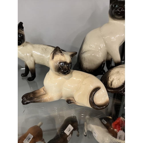 145 - Collection of Beswick cats - Approx height of tallest: 24cm