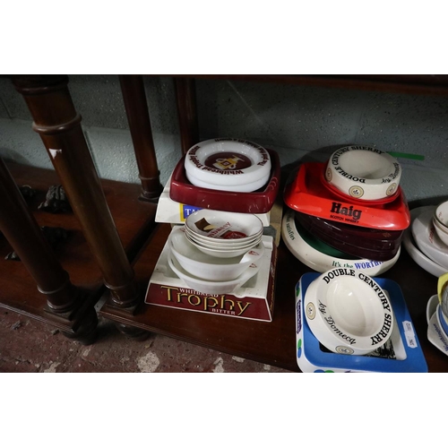 178 - Large collection of pub ashtrays together with Flowers match brick