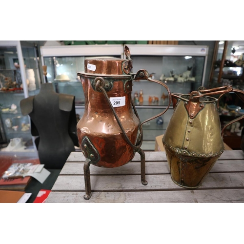 205 - Copper and brass jugs