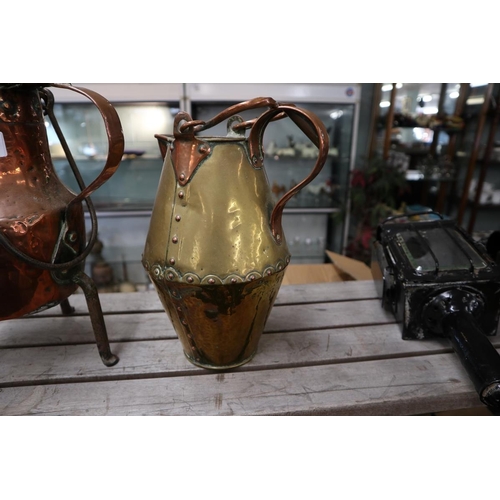 205 - Copper and brass jugs