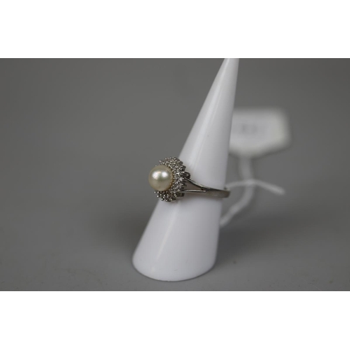 27 - 14ct white gold pearl & diamond set ring - Size M