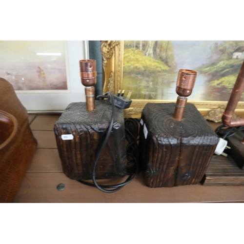 298 - Pair of rustic bedside lamps together with another