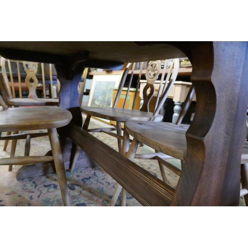 304 - Ercol table with 4 chairs and 2 carvers