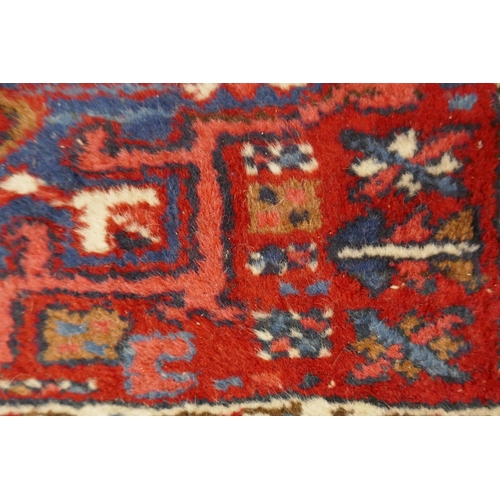 307 - Small red patterned rug - Approx size: 104cm x 136cm