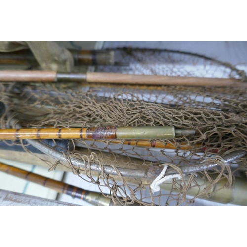 337 - Collection of vintage fishing rods etc.