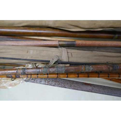 337 - Collection of vintage fishing rods etc.