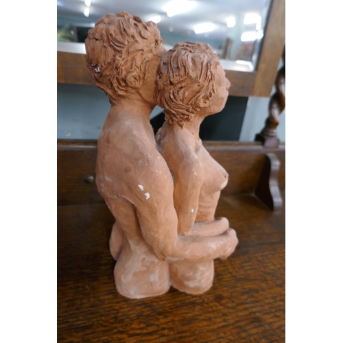 370 - Terracotta figure of lovers - Approx height: 31cm