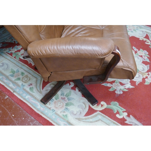 389 - Brown leather swivel easy chair