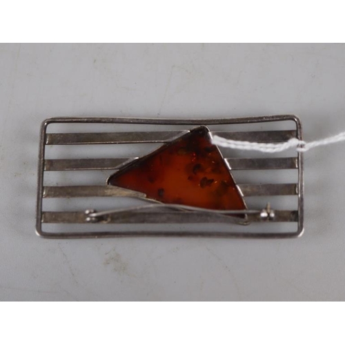 57 - Old silver & amber brooch