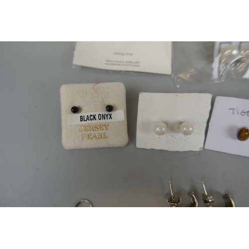 68 - Collection of silver earrings