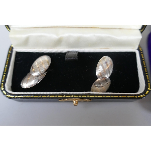 75 - 3 pairs of hallmarked silver cufflinks dated 1974,1957 & 1979