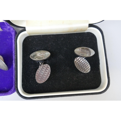 75 - 3 pairs of hallmarked silver cufflinks dated 1974,1957 & 1979