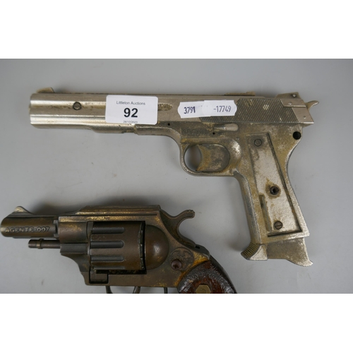 92 - 1970s Agent 007 James Bond toy gun together with 1980s Magnum toy gun