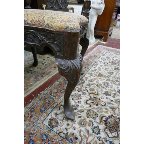 451 - Fine carved oak corner chair adorned with flowers
