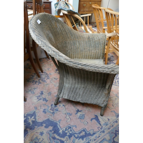 453 - Lloyde Loom arm chair