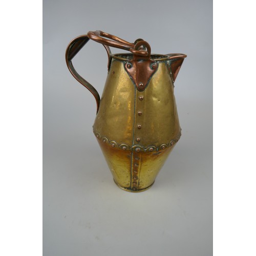 205 - Copper and brass jugs