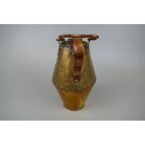 205 - Copper and brass jugs