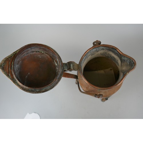 205 - Copper and brass jugs